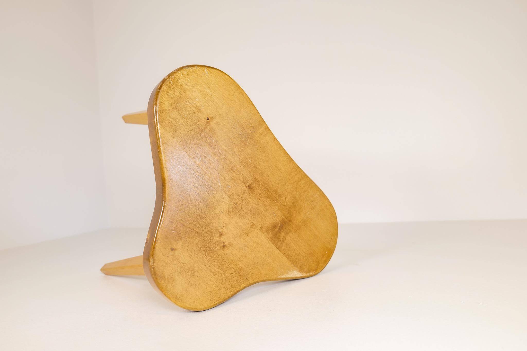 Modern Swedish Scandinavian stool in lacquered birch, 1970s.