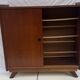 Vintage shoe cabinet with tapered legs
