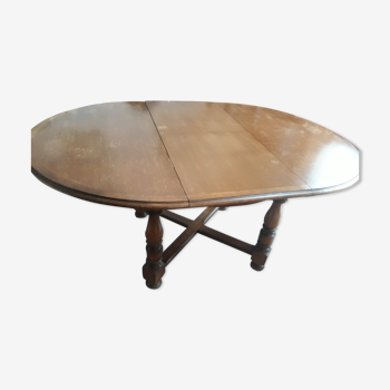 Round cherry table with integrated folding extension