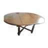 Round cherry table with integrated folding extension