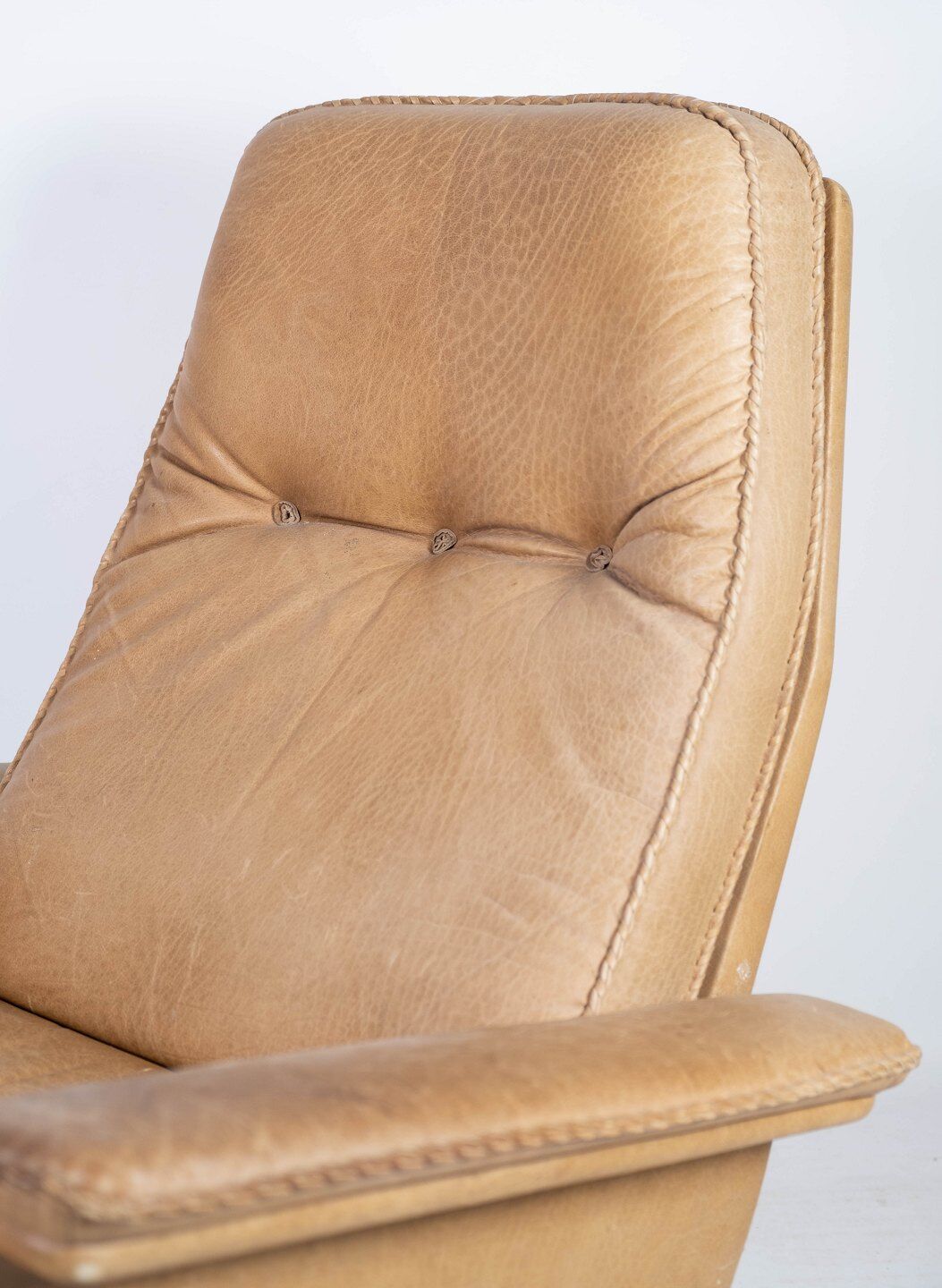 Armchair and stool in 1960s Danish leather and rosewood