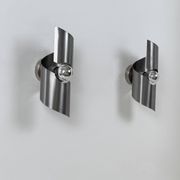Pair of vintage wall lights, curved patinated steel, France, 1970.