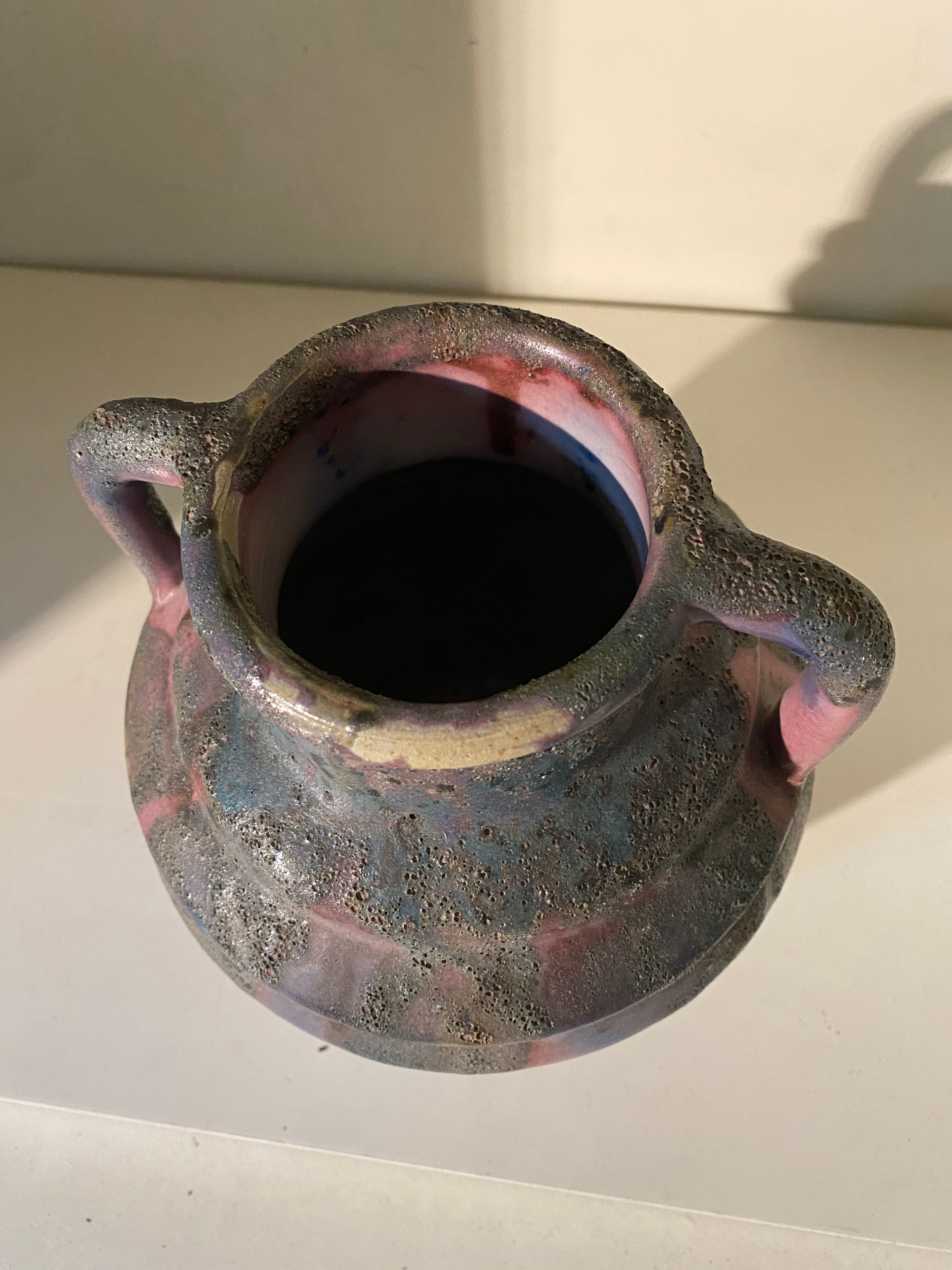 Flaming purple sandstone vase