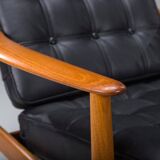 Armchair with Model FD 164 frame by Arne Vodder and Model 118 armrests by Grete Jalk in teak and black leather, Denmark, 1960s