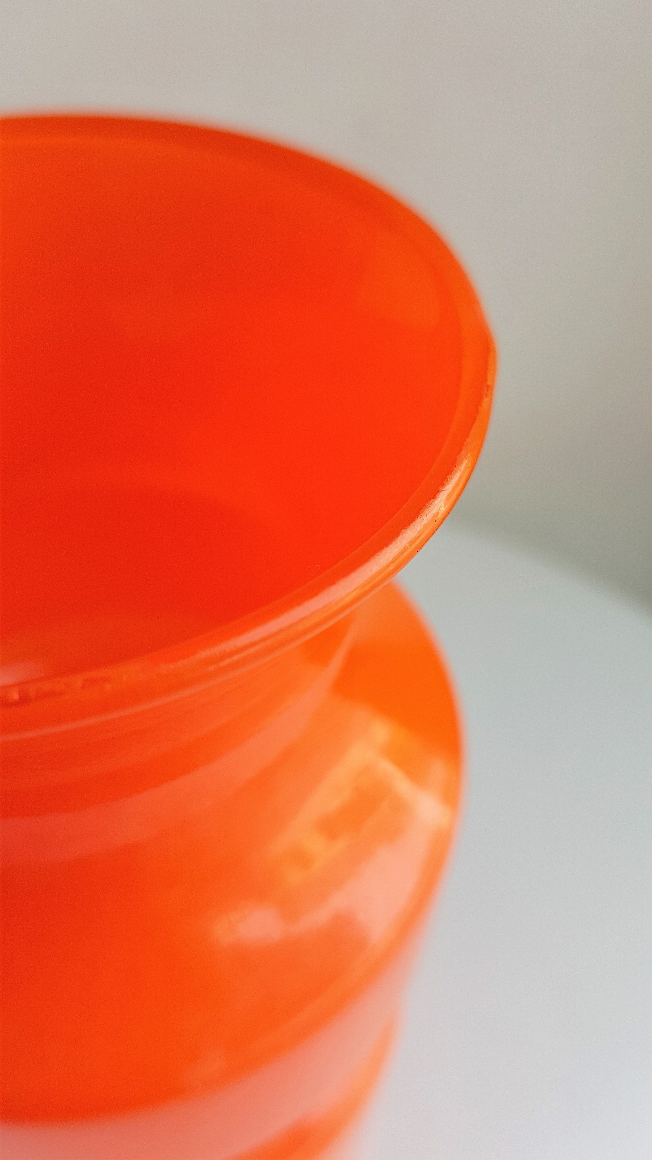Vintage vase in orange glass