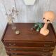 Chest of drawers with tapered feet