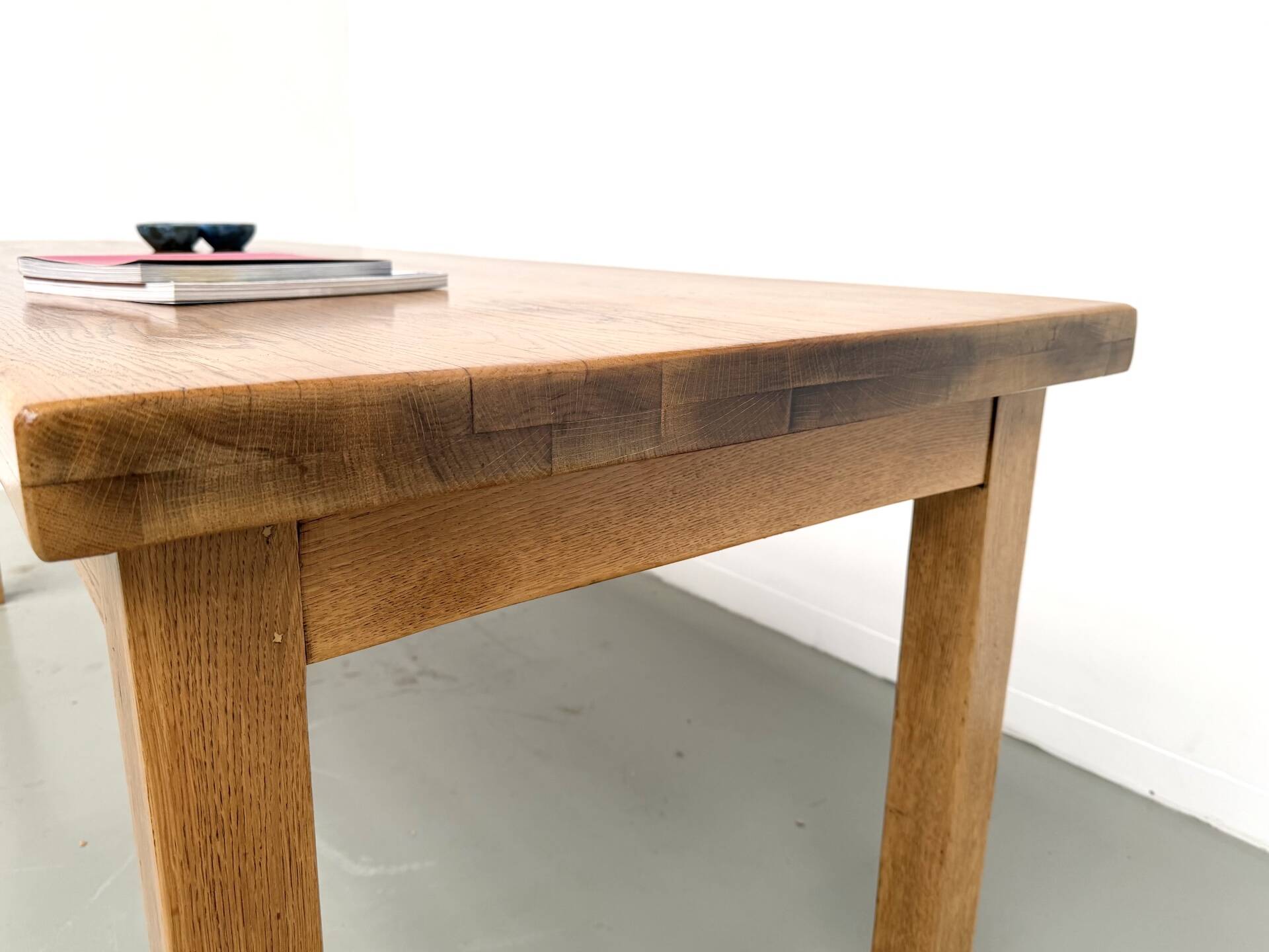 Solid oak farmhouse table, square legs.