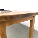 Solid oak farmhouse table, square legs.