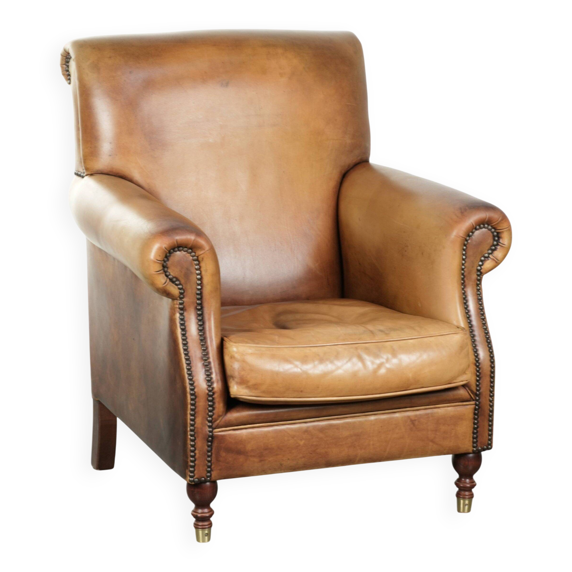 Armchair made of cowhide leather with a characterful English look