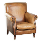 Armchair made of cowhide leather with a characterful English look