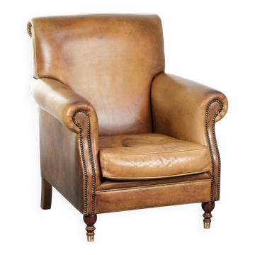 Fauteuil en cuir de vachette au look anglais caractéristique