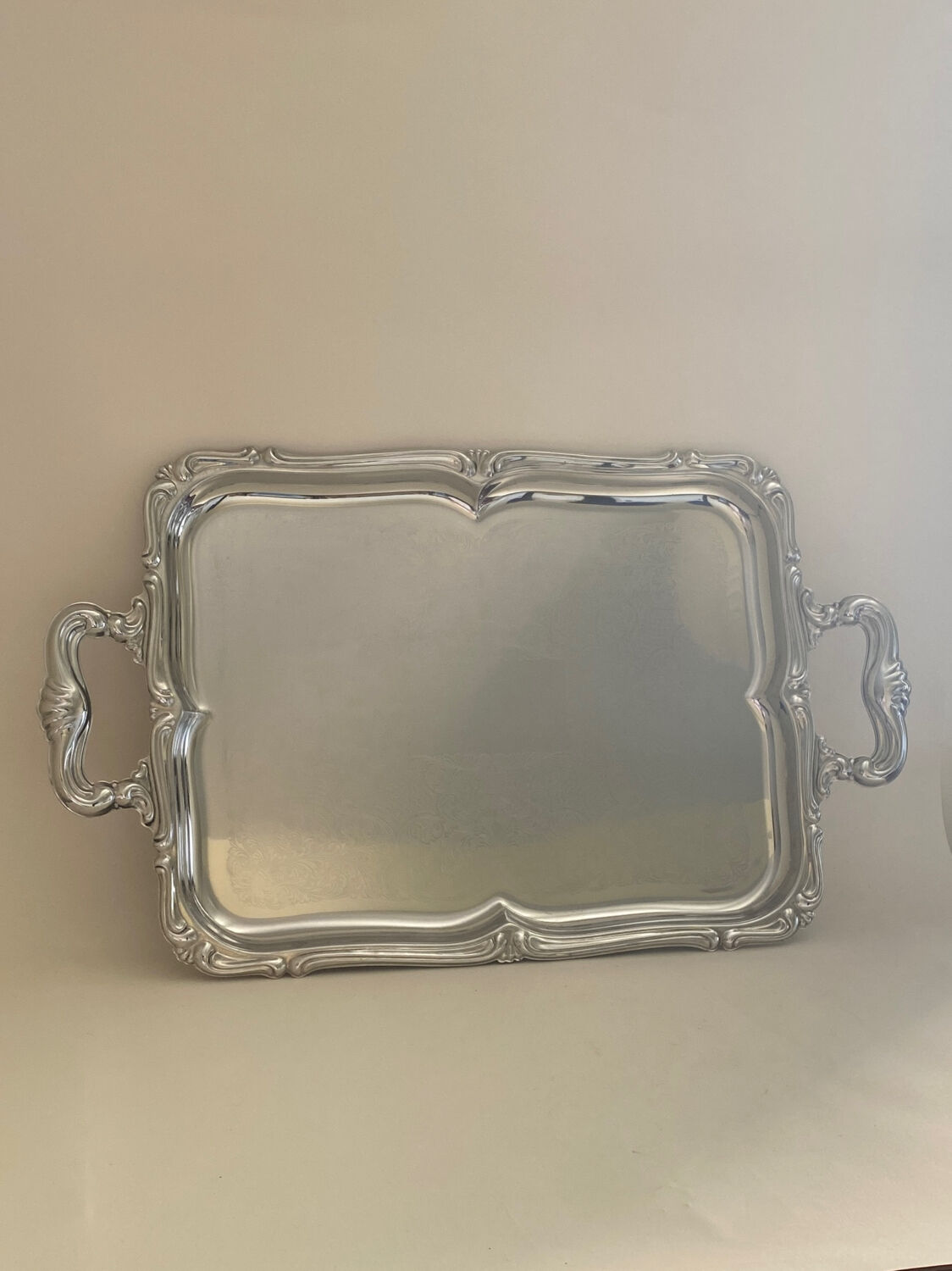 Baroque stainless steel tray Alessi