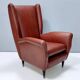 Fauteuil à oreilles en Skai Attr. au modèle 512 attr. à Gio Ponti Produit par ISA