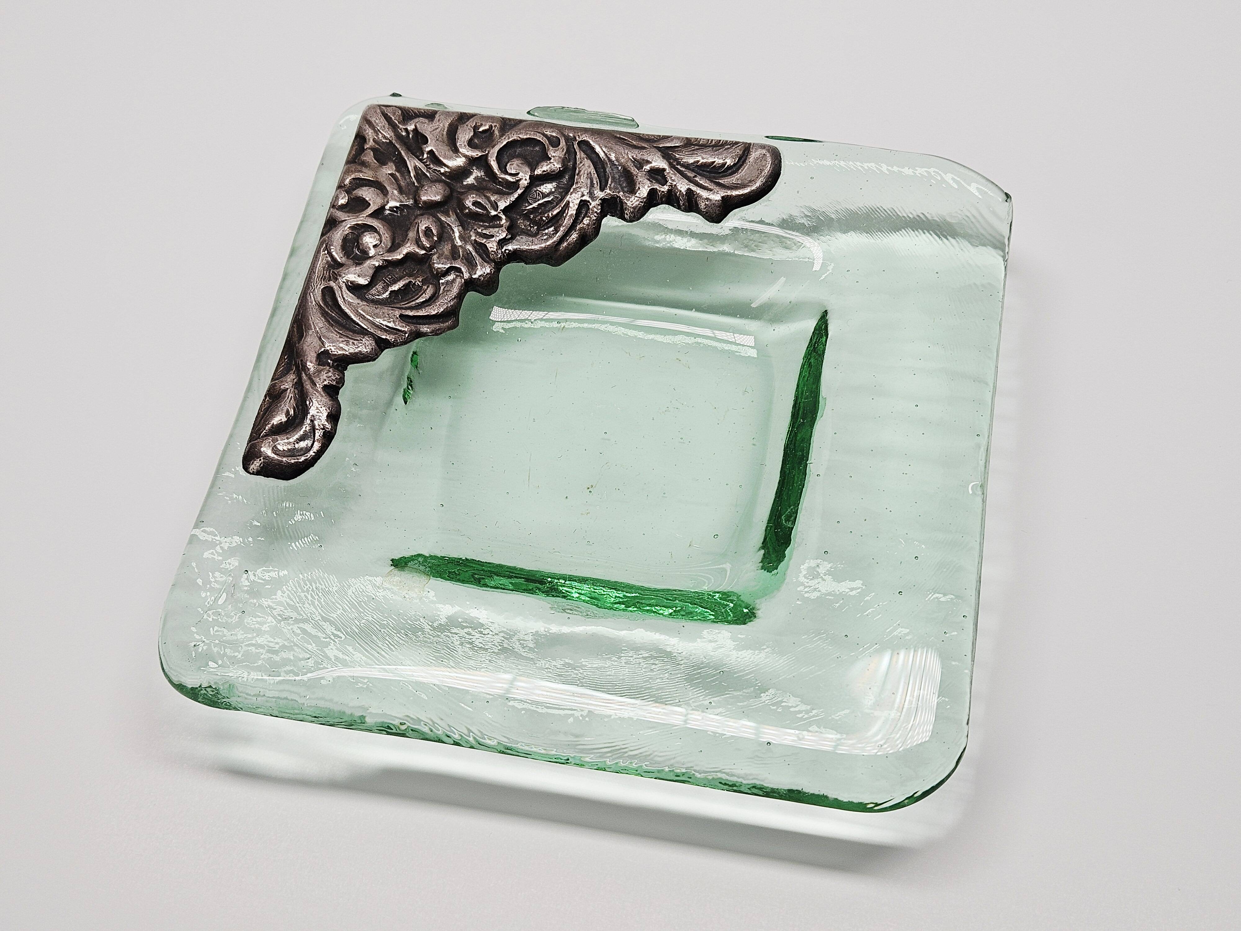 Murano glass catchall, corner adorned with baroque patterns.