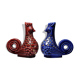 Pair of ceramic glazed candlesticks in the shape of roosters, signed A.G Roger, year 1948.