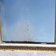Miroir à fronton or et argent 71x115cm