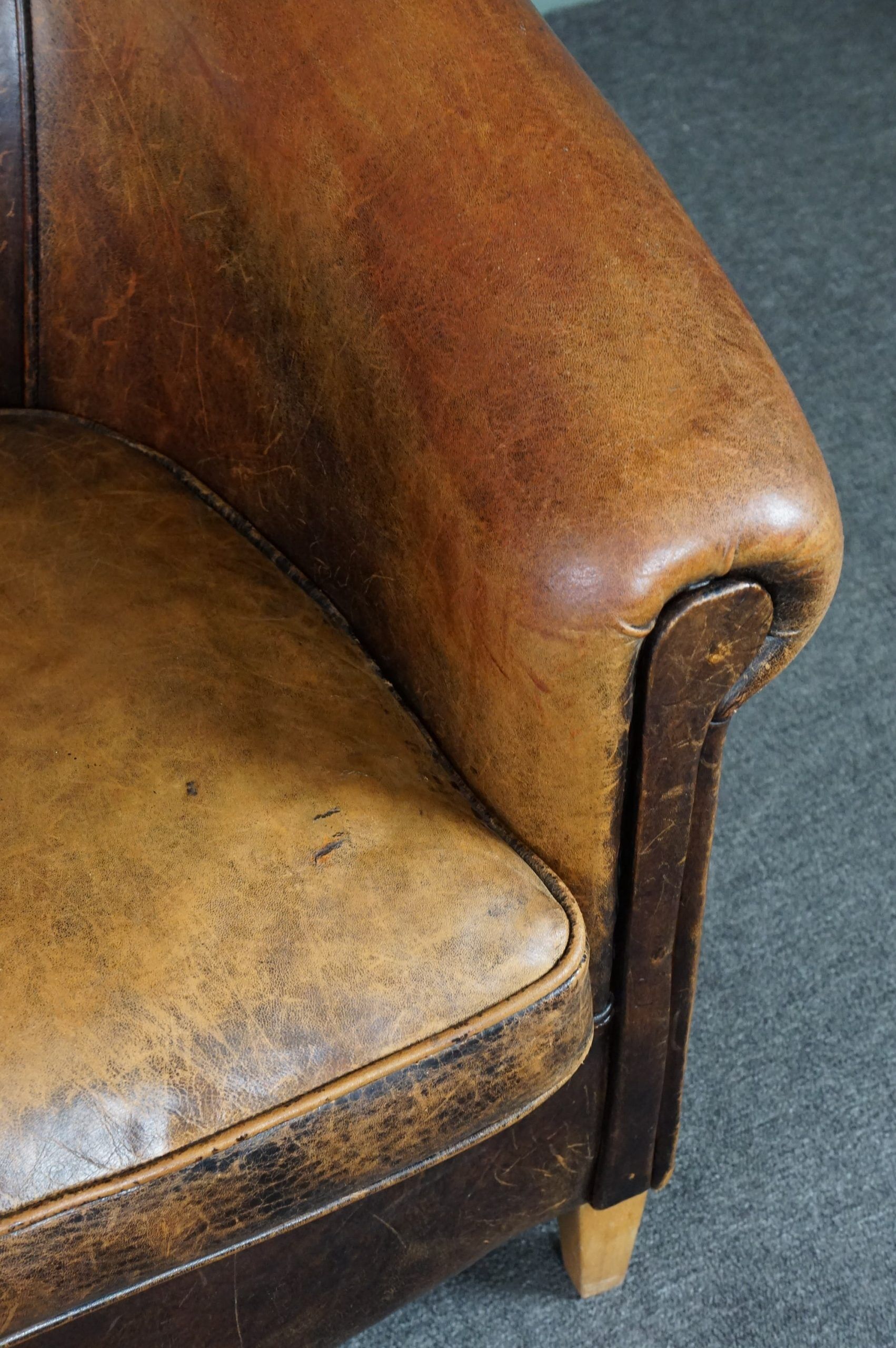 Fauteuil club en cuir de mouton