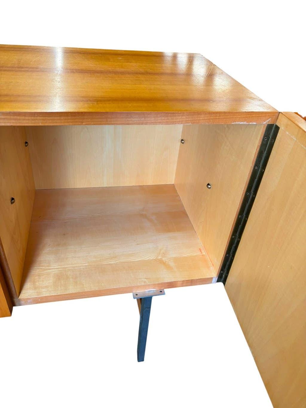 Vintage wooden storage cabinet with chrome legs