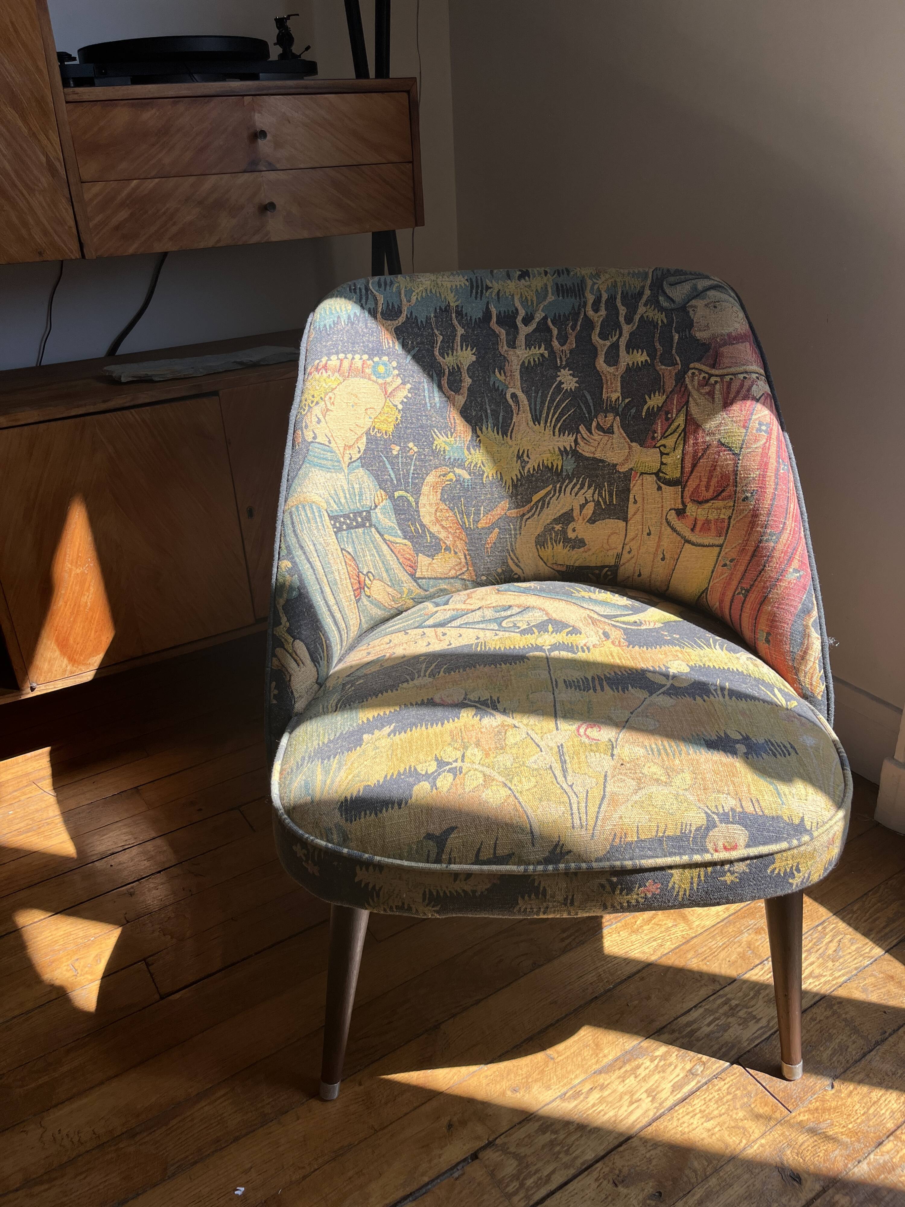 J. Tenreiro, Brazil. Concha armchair with tapered legs, Cluny tapestry 1400.