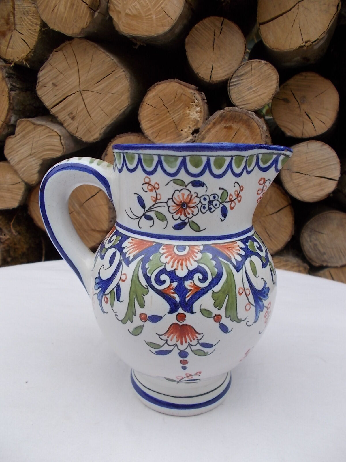 Decorated earthenware jug