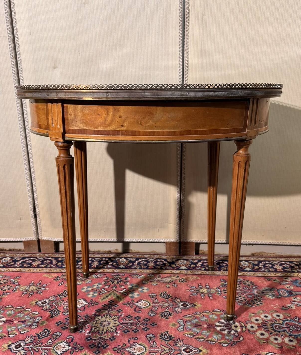Louis XVI style bouillotte table in light wood and marquetry.