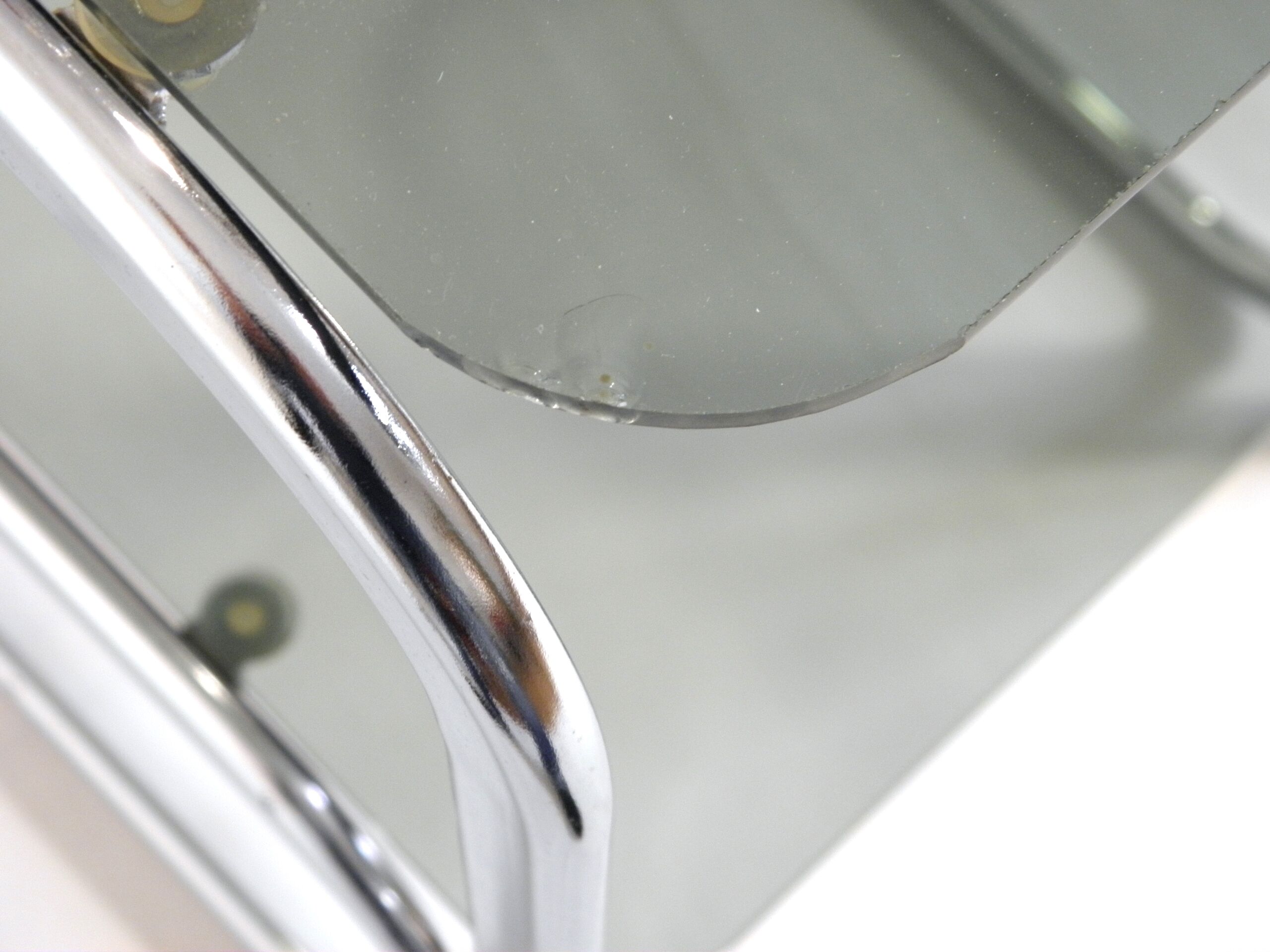 Pair of chrome bedside and 70s glass