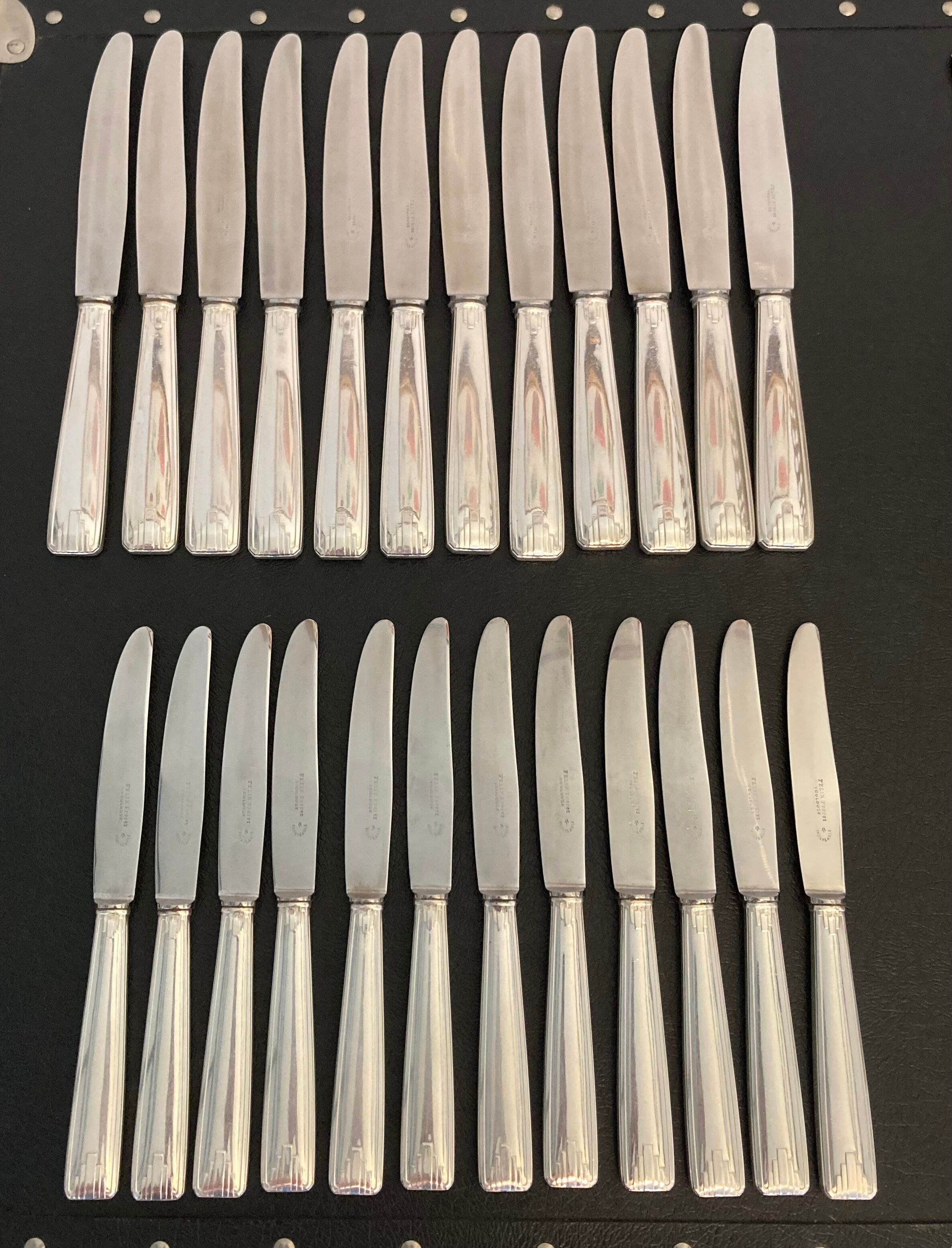 Set of 24 silver metal knives art deco