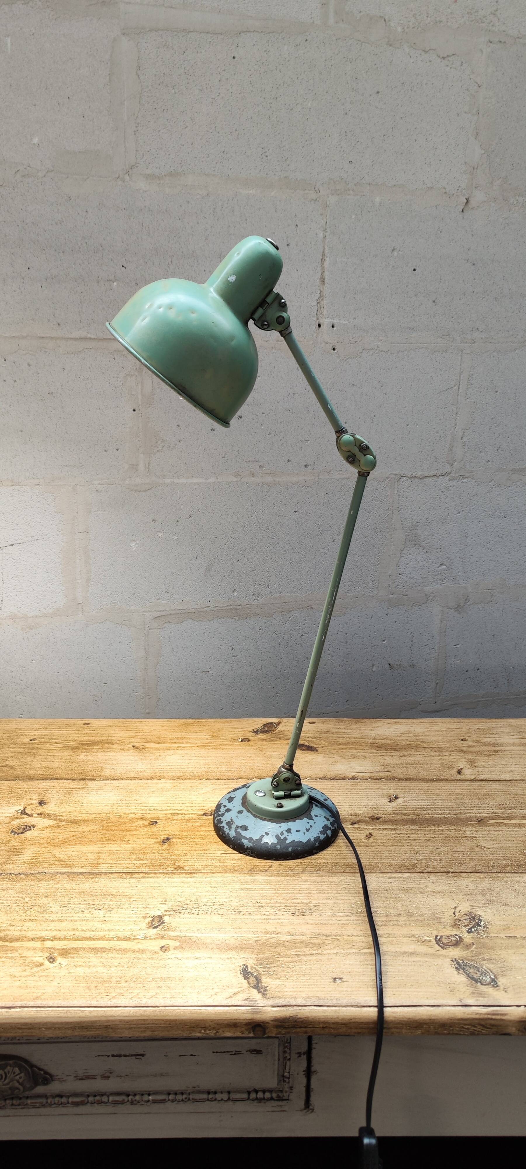 Old green industrial desk lamp