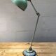 Old green industrial desk lamp