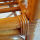 Set of 2 armchairs in adult varnished woven rattan