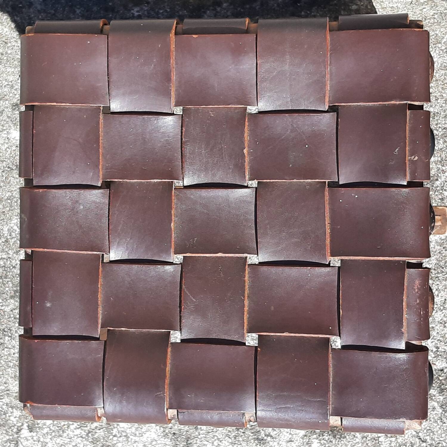 Pair of brutalist stools, leather seat.