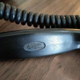 Old bakelite wall telephone