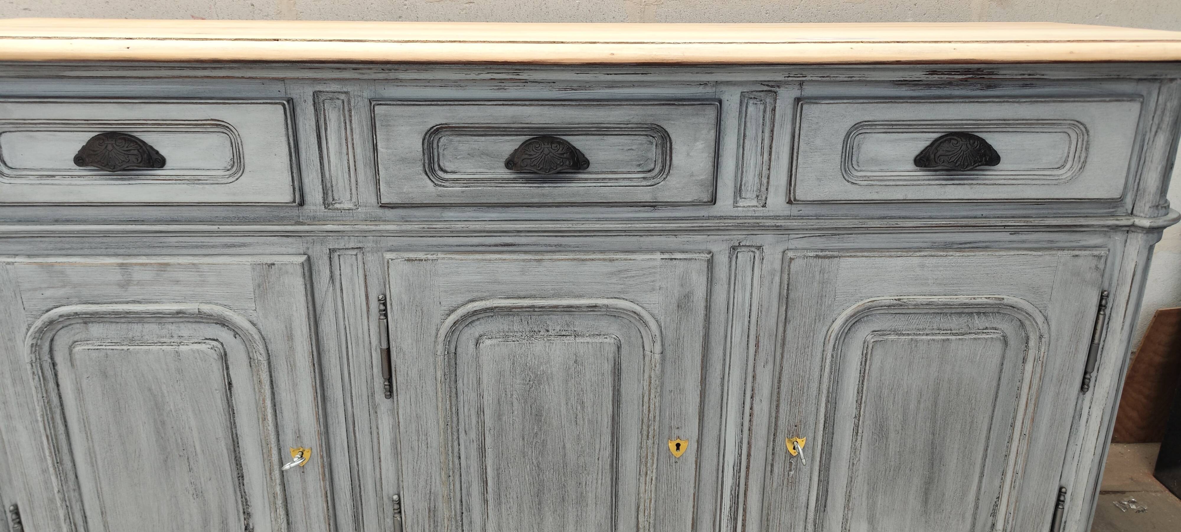 Grey patina furniture with three doors and three drawers