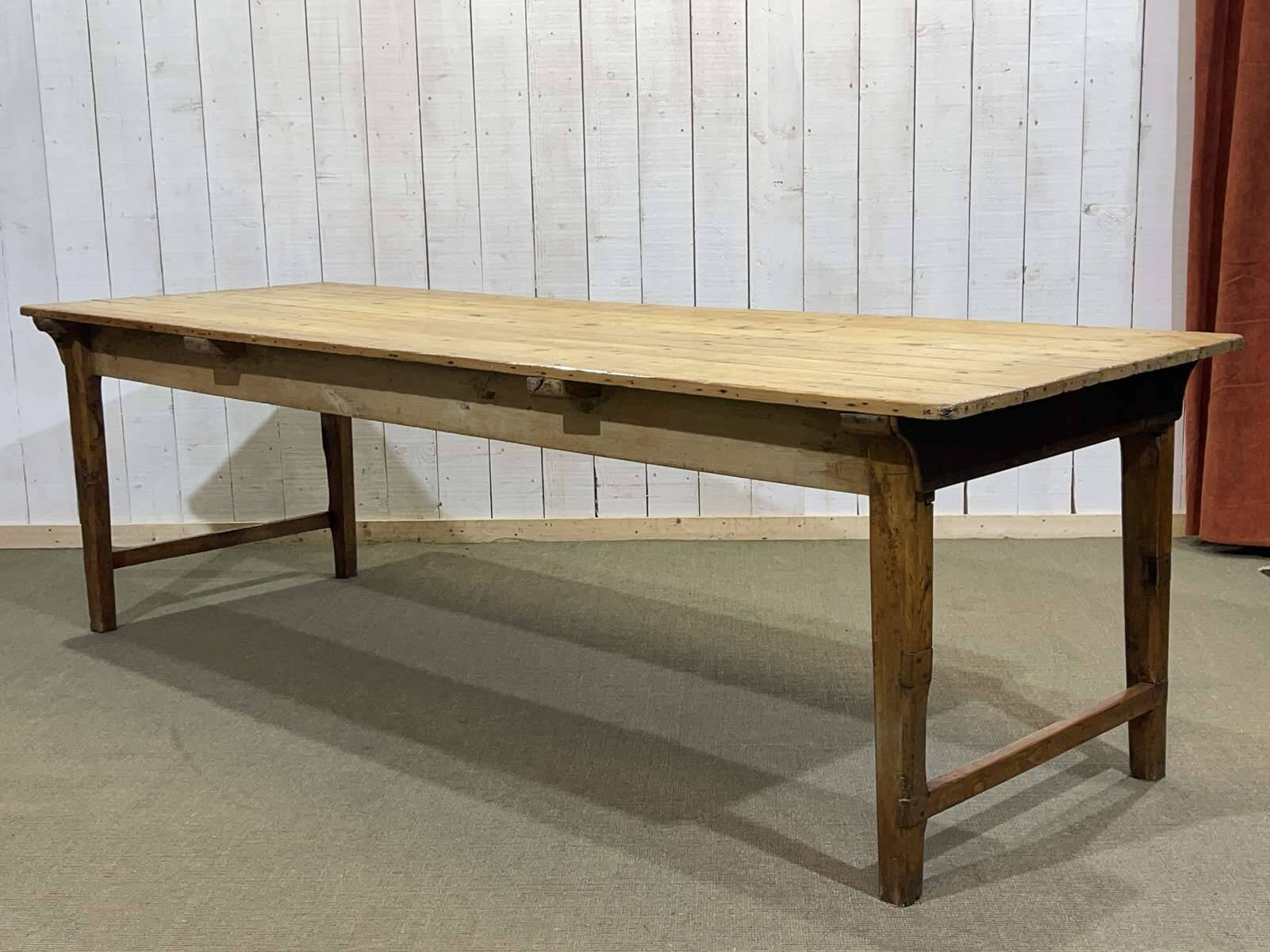 Early 20th-century farmhouse table made of fir, elm, and chestnut.