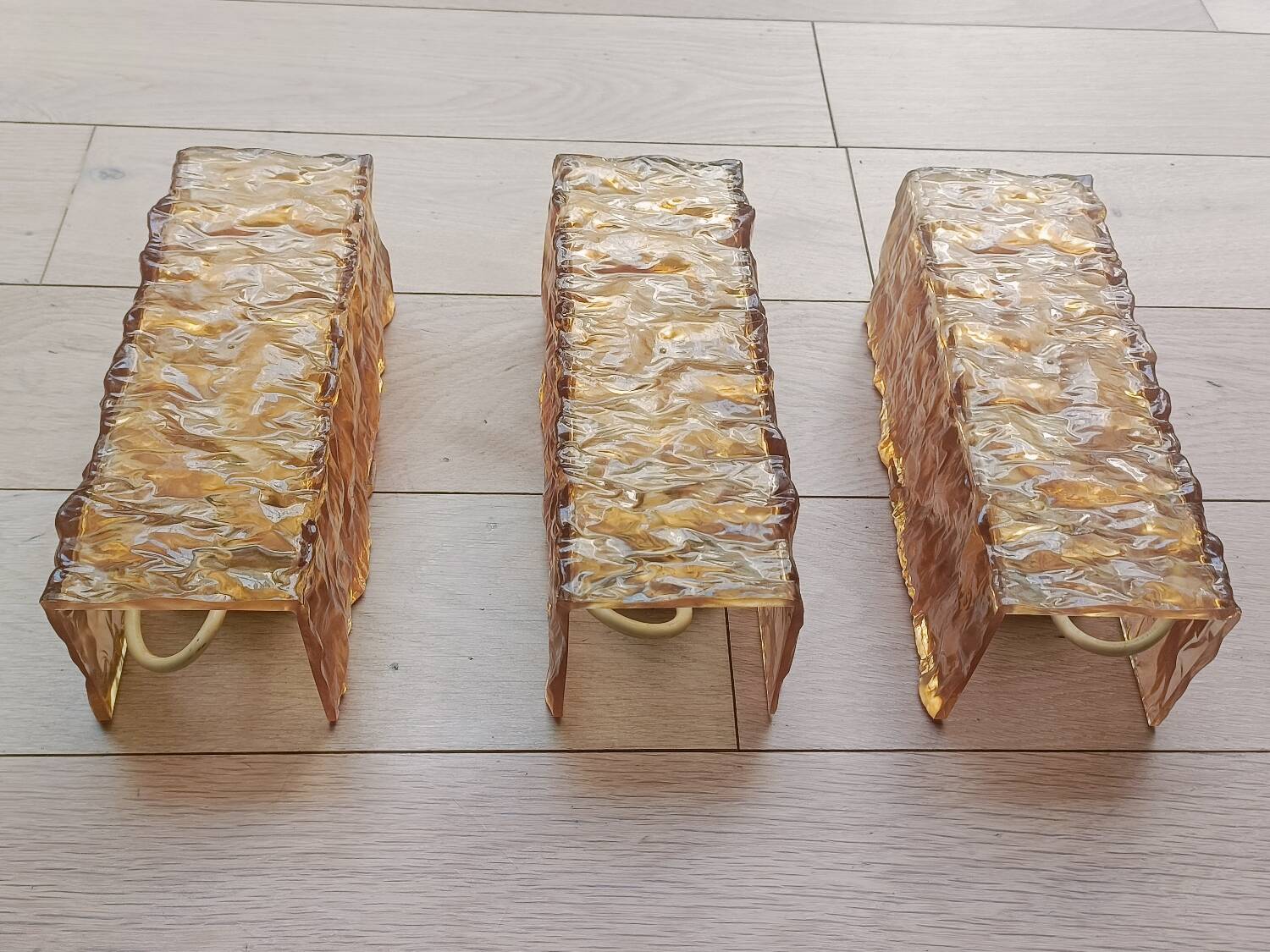 Three 1960s Perspex wall lights