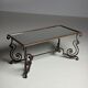 Wrought iron coffee table with mirror glass