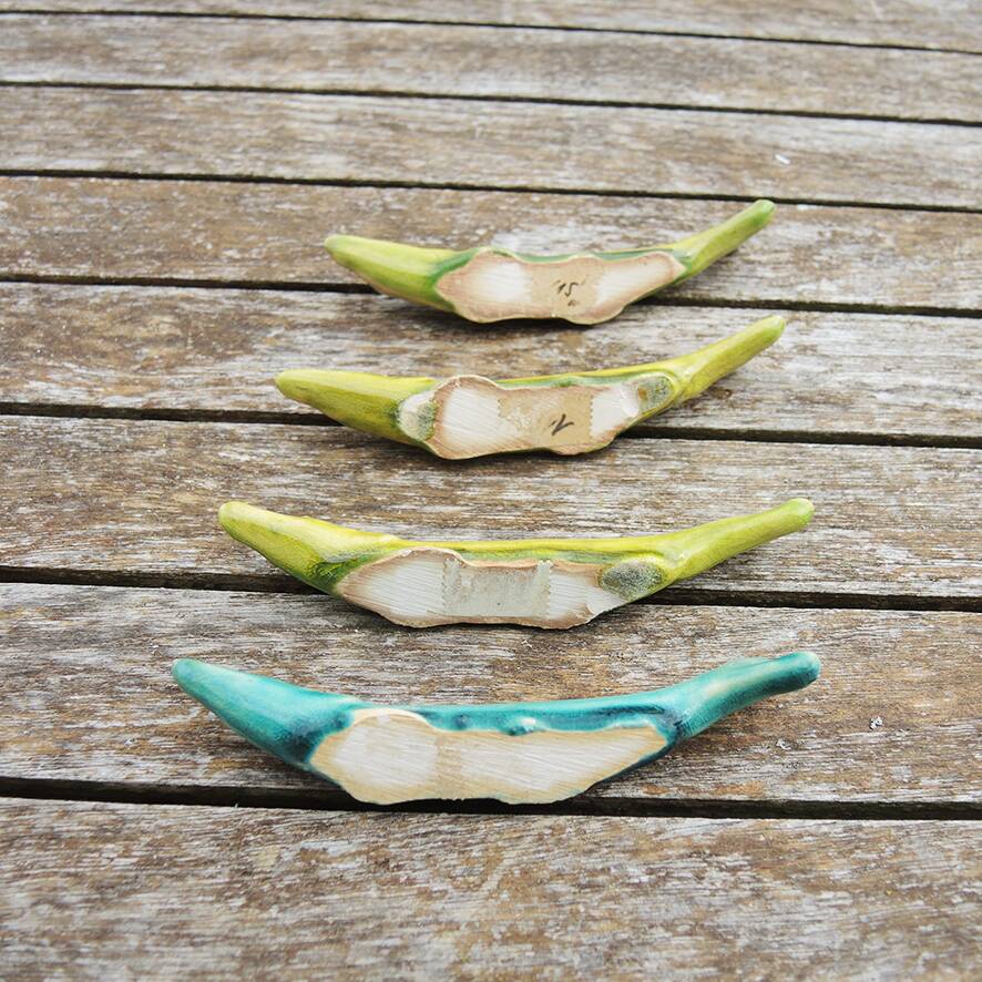 4 antique ceramic fish knife rests