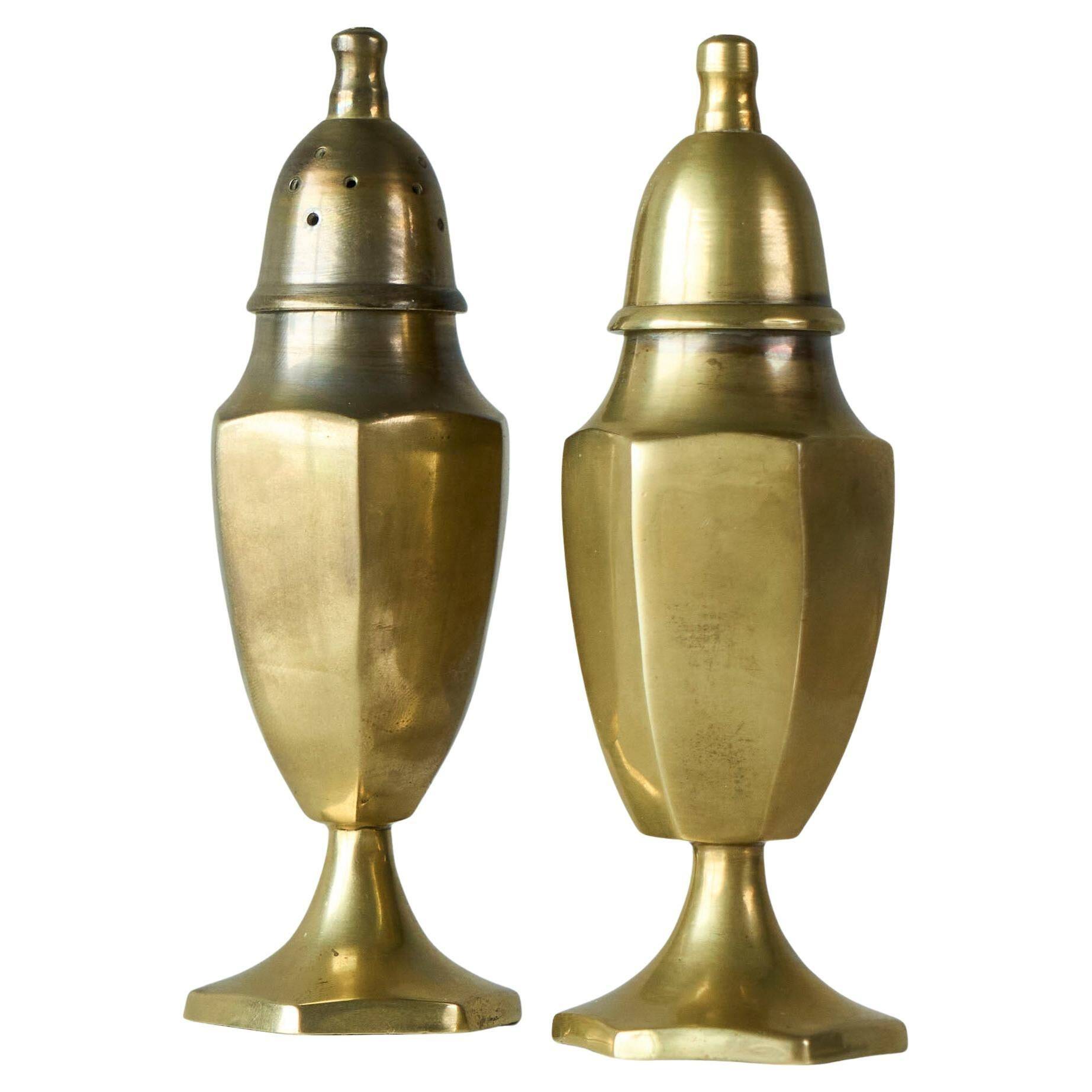 Pair of patinated brass salt and pepper shakers, 20th century.