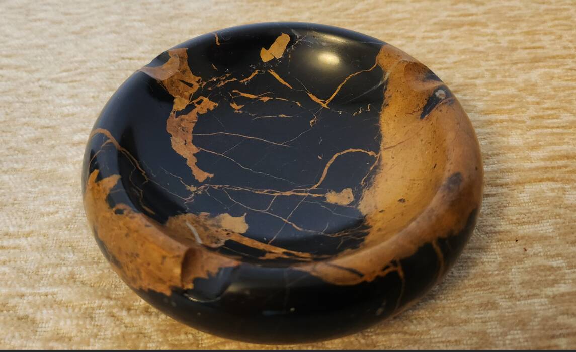 Vintage round ashtray in Italian black and gold Portoro marble.