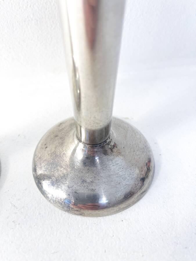 Pair of silver-plated metal candlesticks, 1930