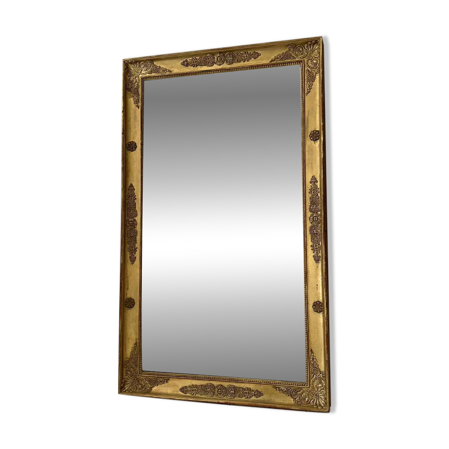 Antique gilded mirror from the Restoration period, 19th century.