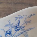 Old pocket emptier decorated with flowers, blackberries and butterflies