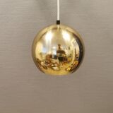 Danish ball lamp from the 80s, in gold colored lacquer.
