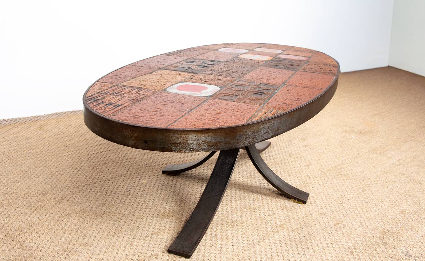 Lava stone, ceramic and steel coffee table by Jean Jaffeux 1960.