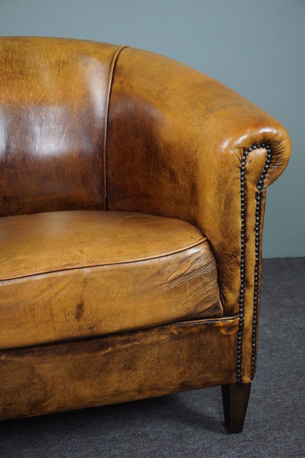 Fauteuil club en cuir de mouton