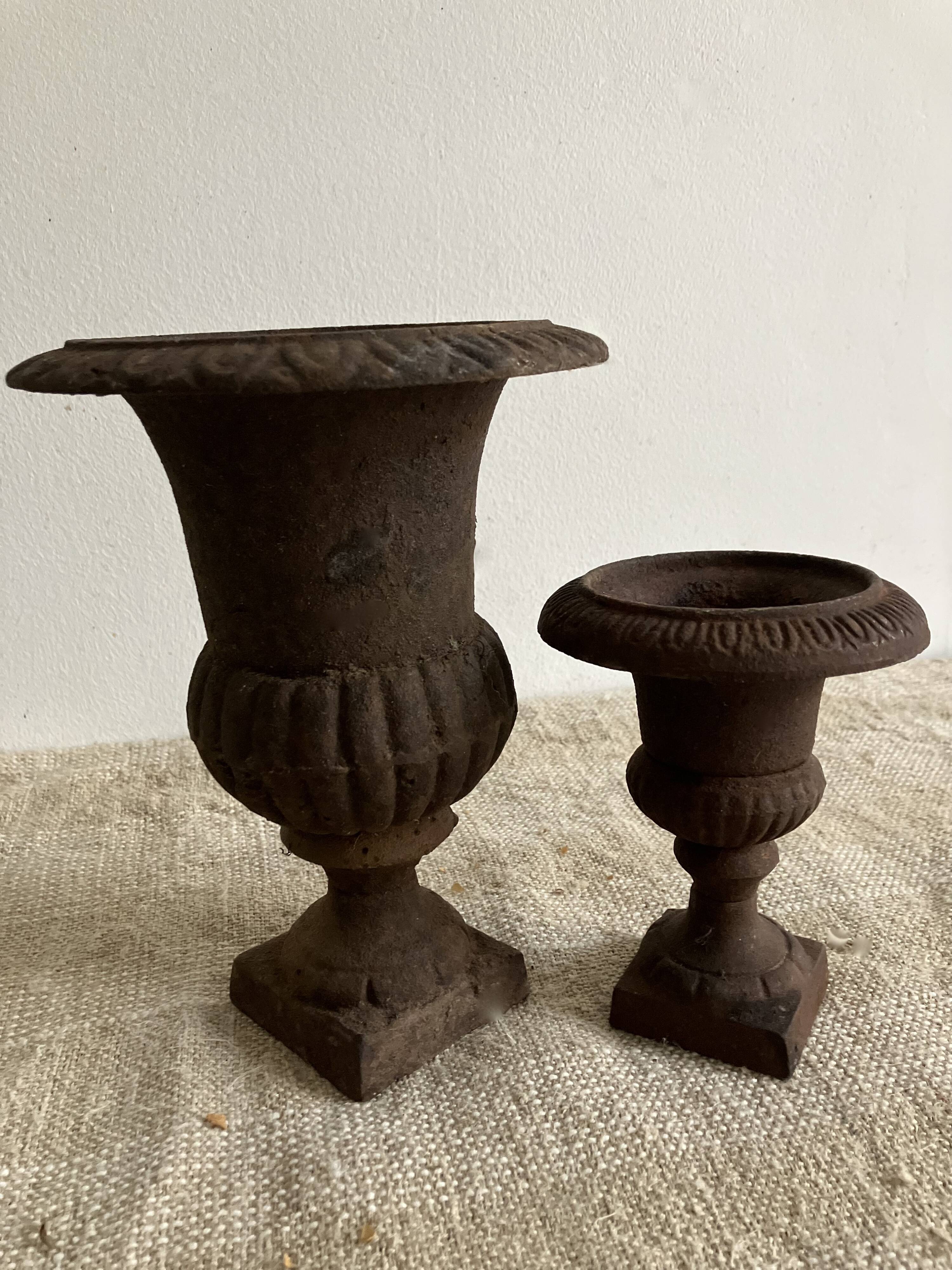 Pair of cast iron Medici vases