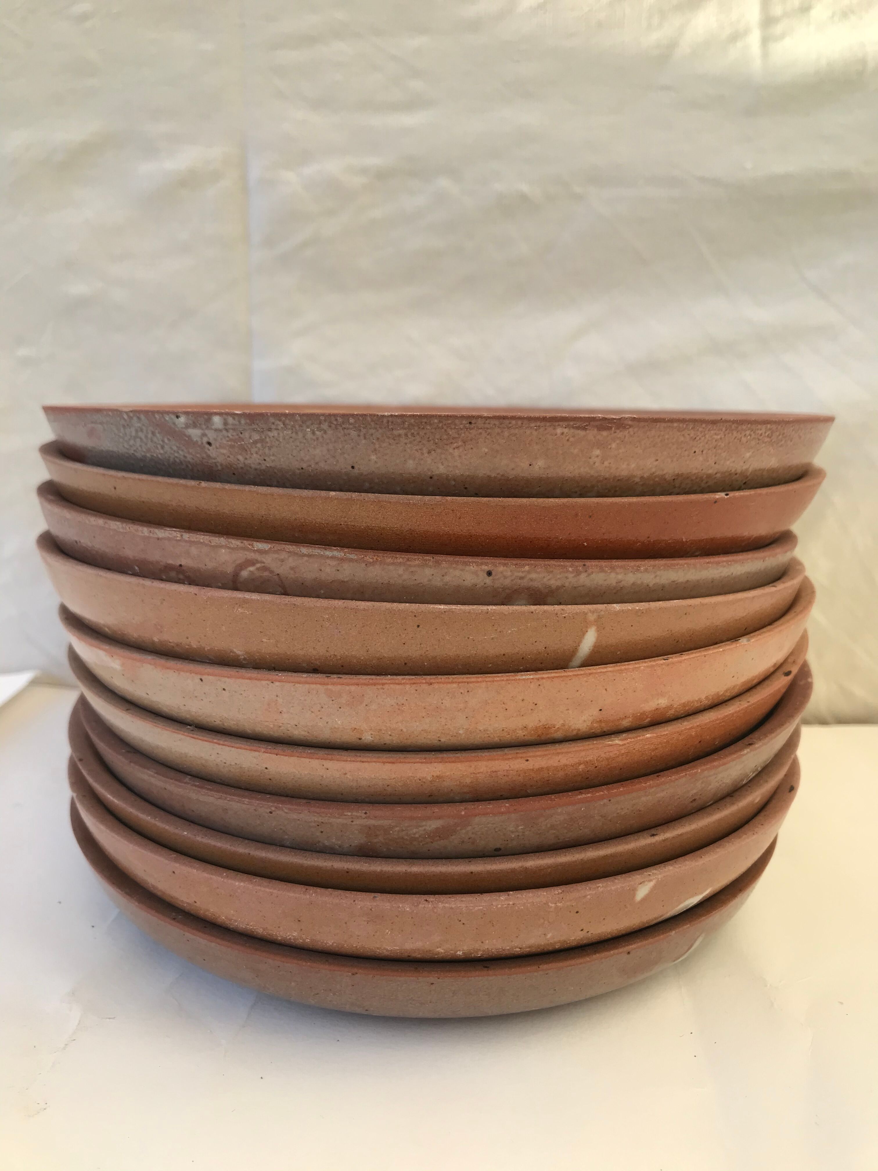 10 small plates made of vintage sandstone