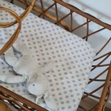 Vintage wicker and rattan couffin on wheels