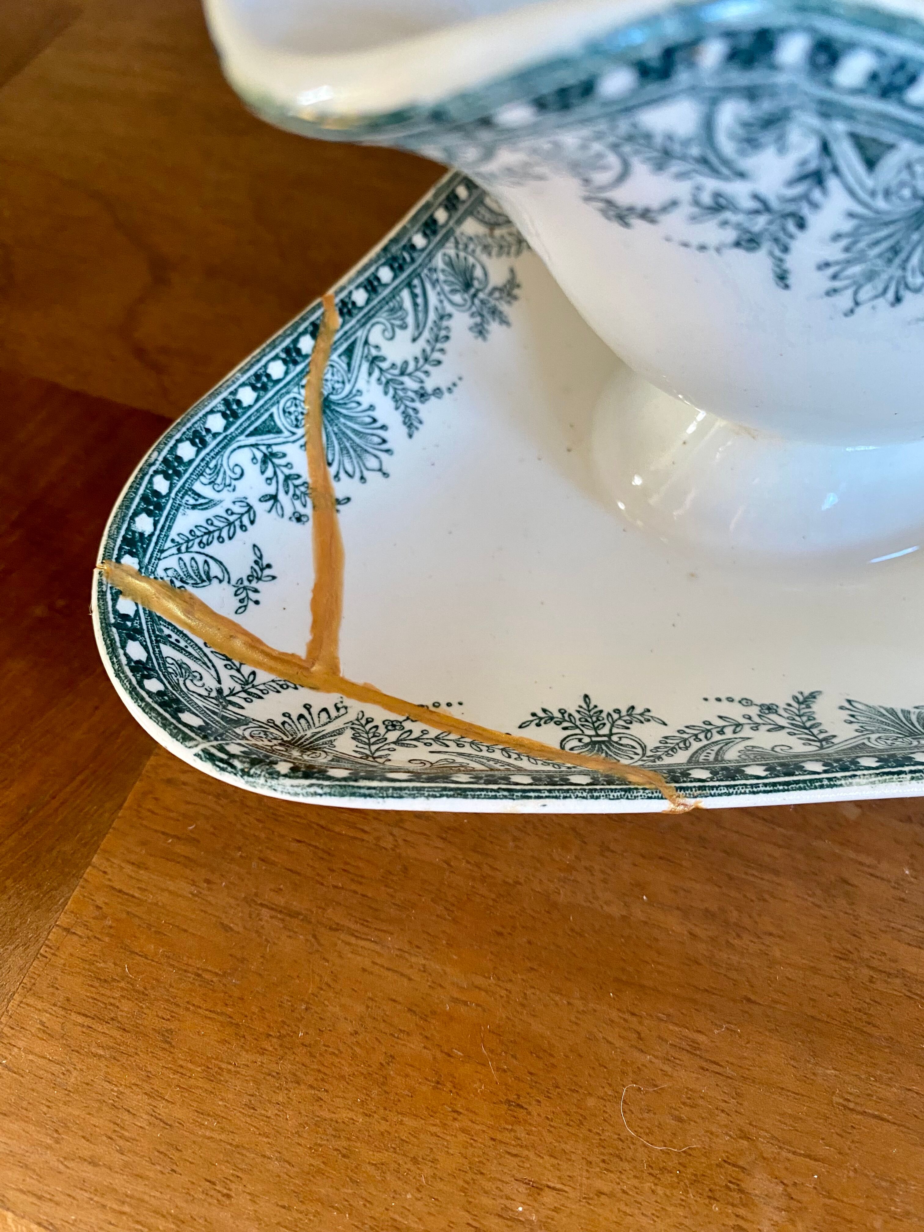 Old gravy boat repaired with the Japanese kintsugi technique