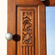 Art Deco wardrobe in carved solid oak with bevelled mirror, 1930.